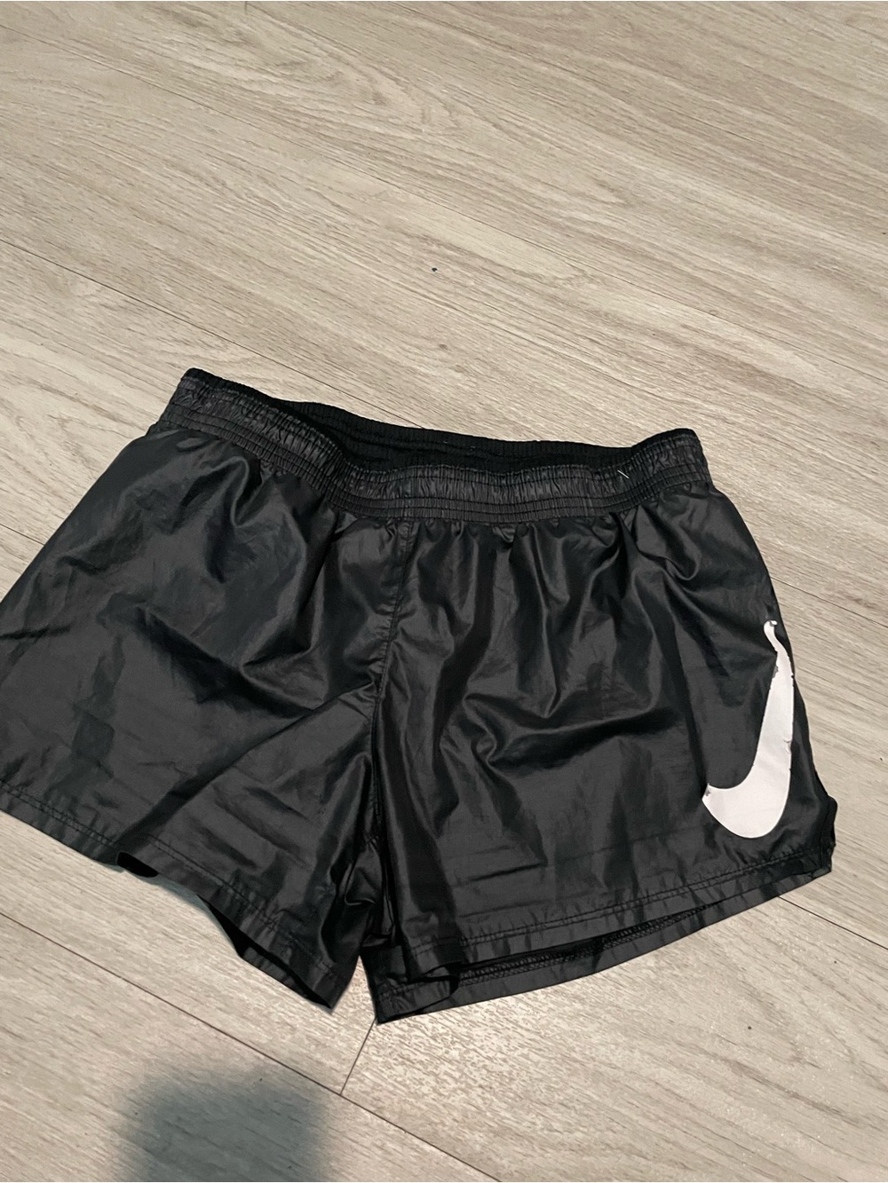 Nike Black Women’s Athletic Shorts with White Swoosh